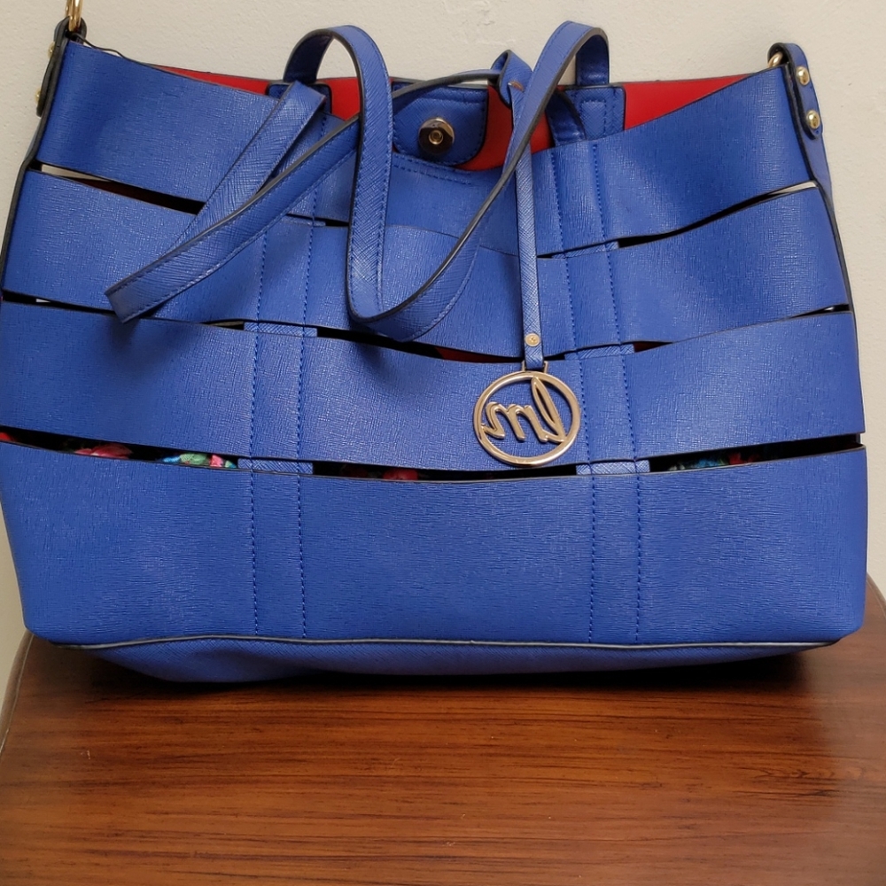 Blue Purse with red lining and